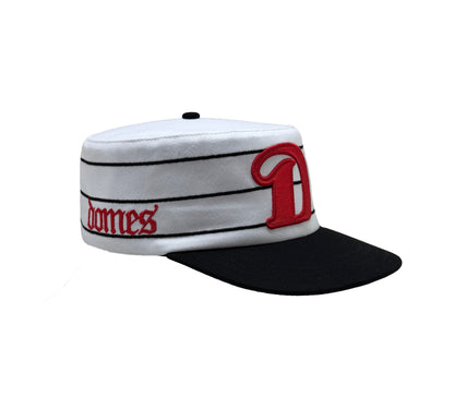 White and red pillbox cap side view