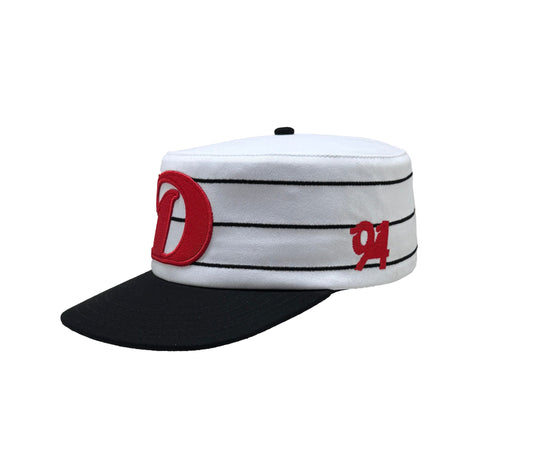White and red pillbox cap, 90s streetwear style
