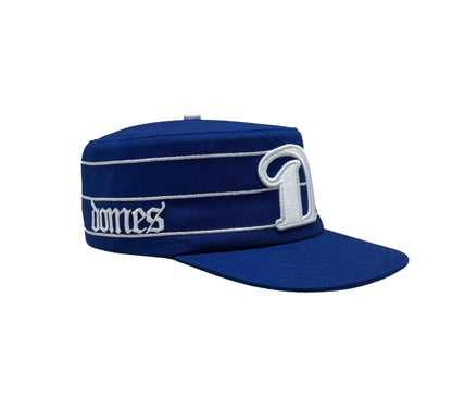 Royal blue and white pillbox cap side view