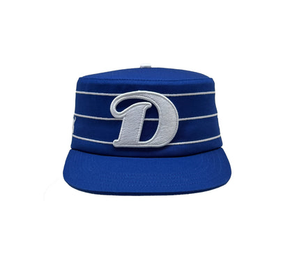 Royal blue and white pillbox cap front view